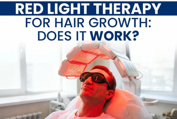 Man wearing protective goggles under a red light therapy device with text asking if red light therapy for hair growth works.